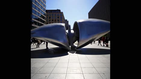 modern metal sculpture in urban setting