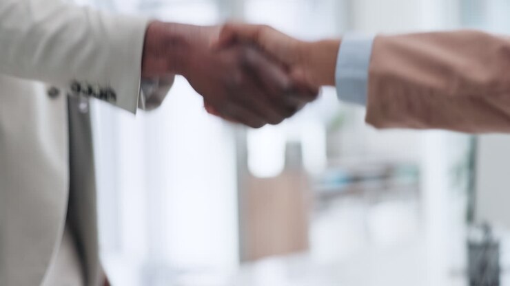 Business people, shaking hands and meeting