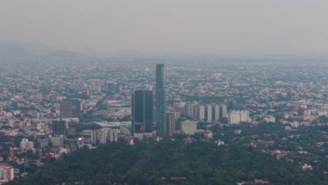 skyscrapers in south of cdmx, smoggy and cloudy day