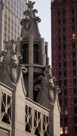 architectural detail of a building with a skyscraper background