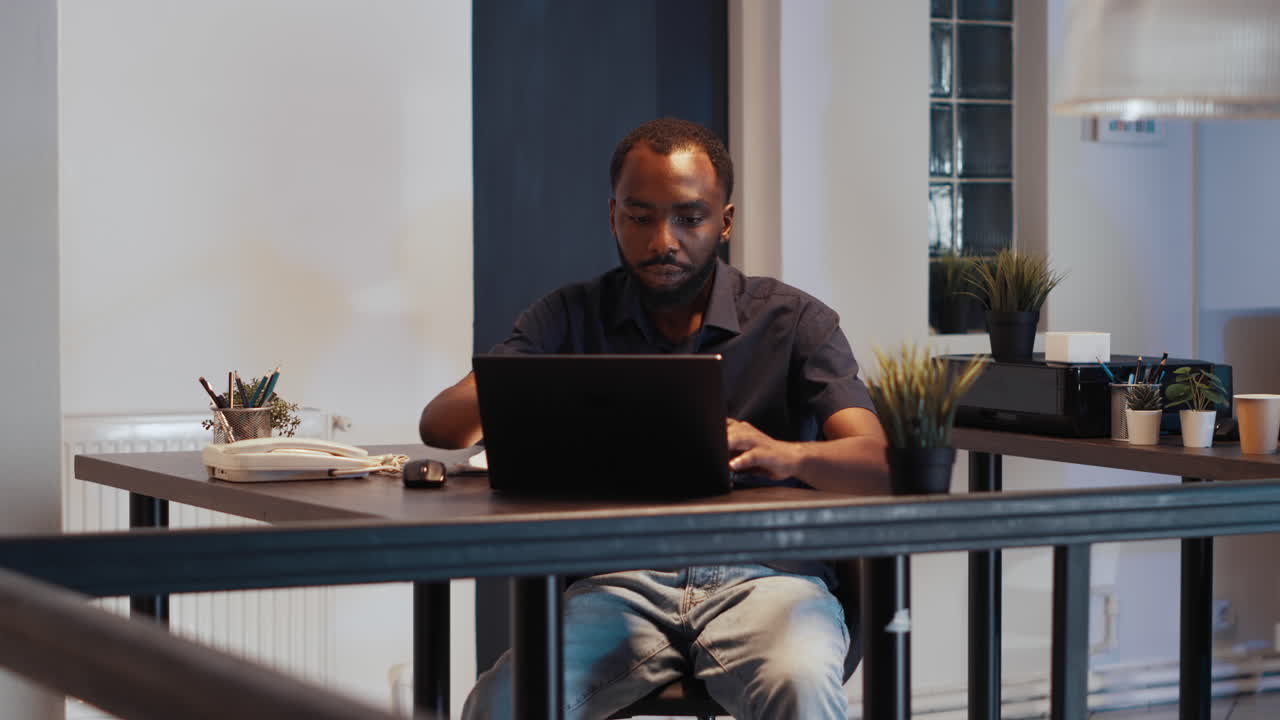 Executive manager working late at night to create presentation