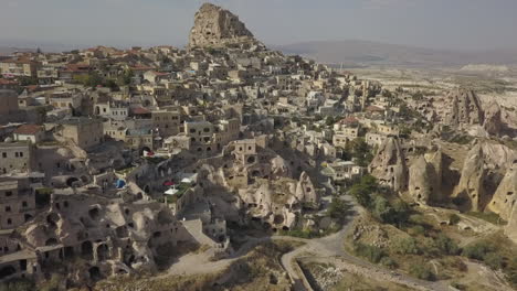 town of uchisar built around imposing ancient cave dwelling tower