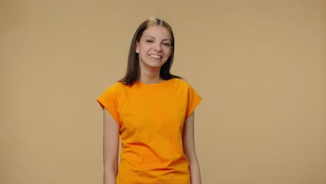 smiling young woman in orange t-shirt