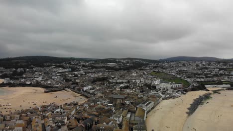 Aerial-panning-right-shot-of-the-beaches-at-St-Ives-Cornwall-England