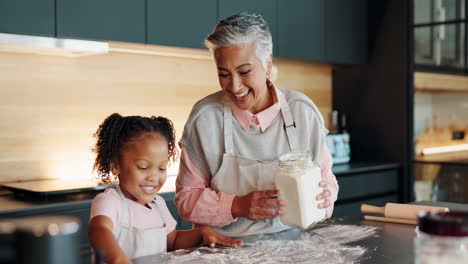 grandmother baking with her grandchild in the kitchen