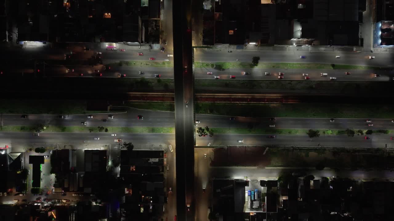 Night drone shot of one of the main avenues in Ecatepec, Mexico