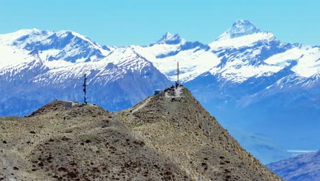 aerial panoramic of roys peak mountain summit and beautiful high mountains background, new zealand