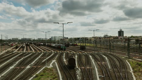 Pan up and down of train formation or fiddle yard while tank wagons rolling to designated tracks