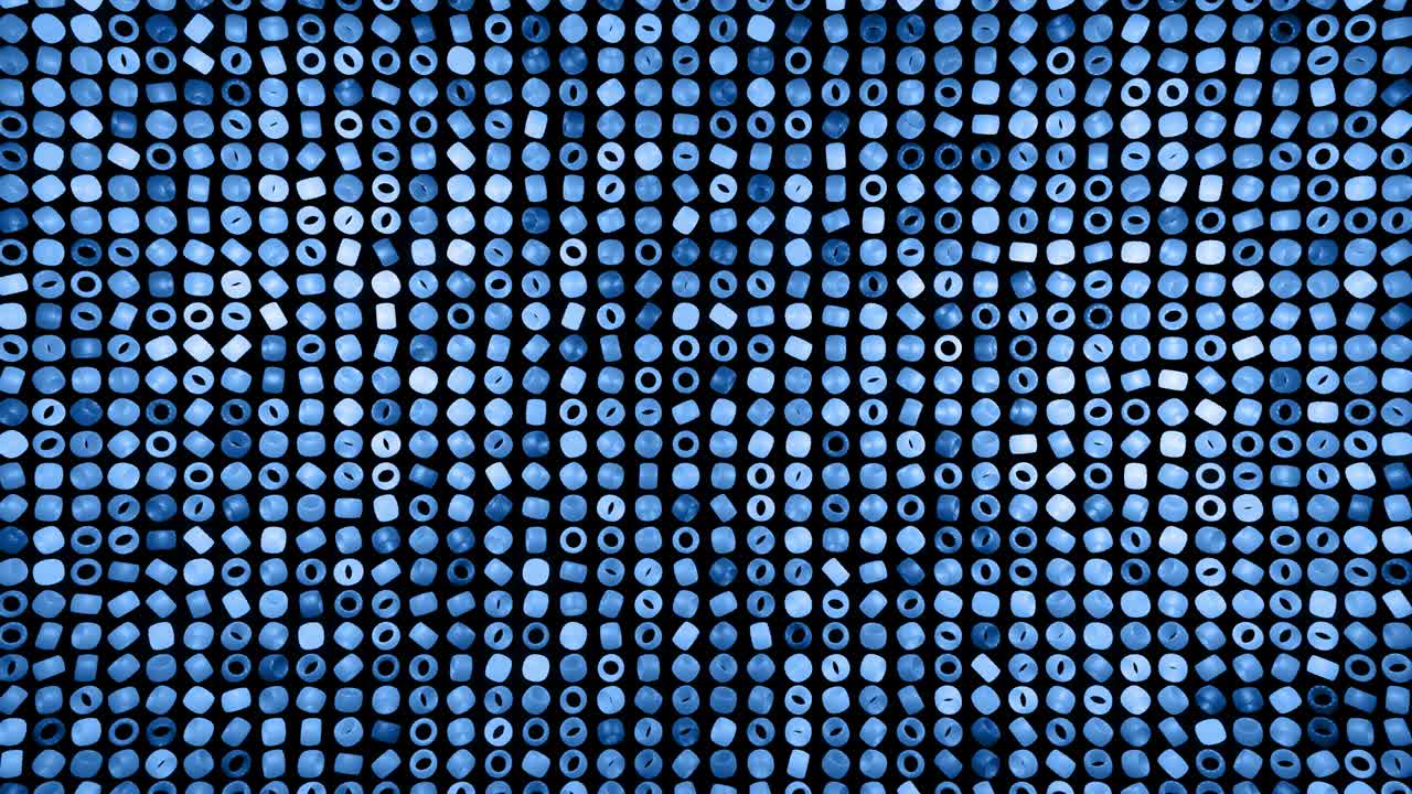 abstract festive background with rows of toruses or rings on plane flashing neon blue light randomly. Black rings rotating in the air. Loop beautiful bg in 4k. Smooth wiggling animation