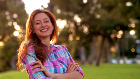 Profile-Shot-Young-Woman-Crossing-Arms-Laughing-Very-Happy