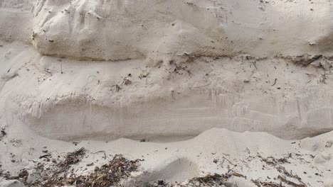 Steep-beach-sand-bank-collapses