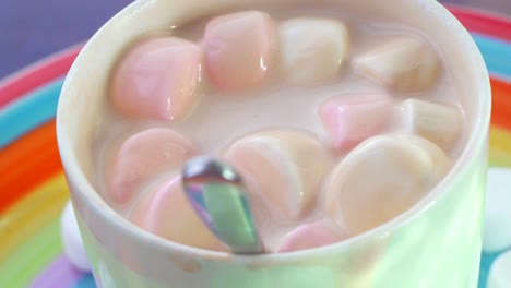 marshmallow in a cup with spoon rotates