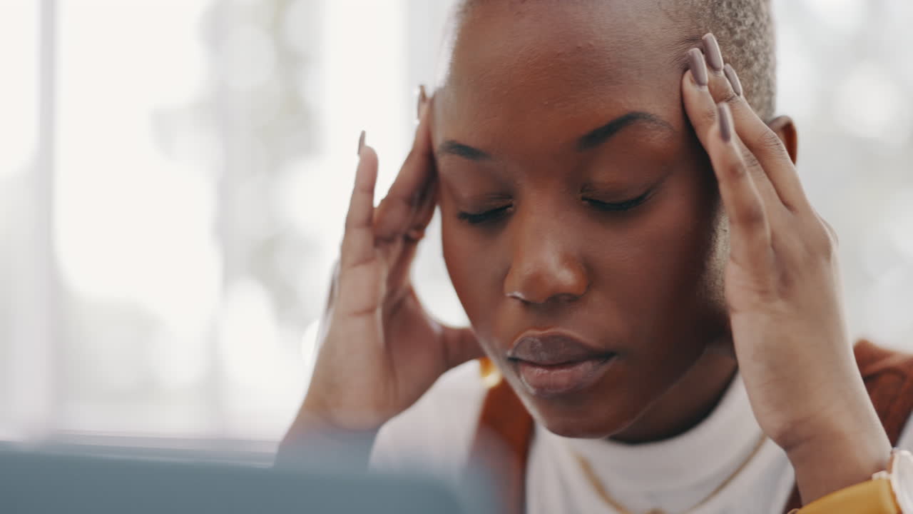 Stress, burnout and headache of black woman