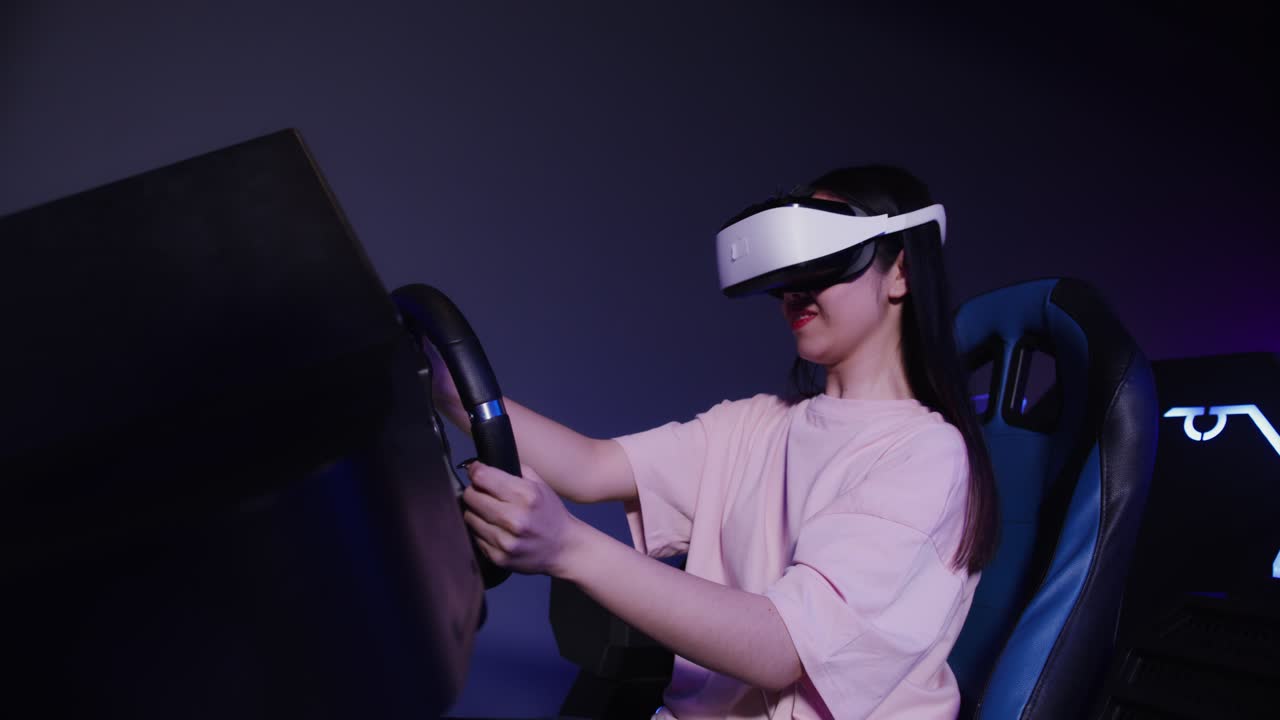 Woman using VR headset in racing simulator