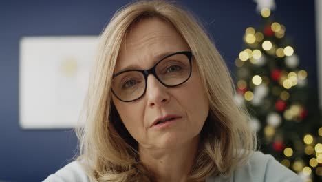 Close-up-video-of-mature-woman-during-a-video-conference