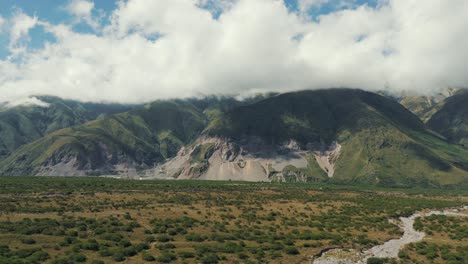 Aerial-view-establishing-the-biodiverisity-of-the-province-of-Jujuy-rich-in-minerals-and-with-a-stable-and-green-ecosystem,-Argentina-part-of-the-lithium-triangle-and-limestone-mining