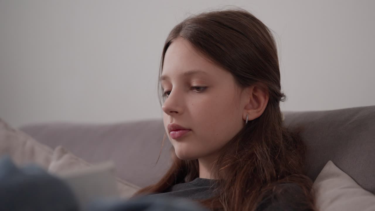 Teenage Girl Relaxing at Home