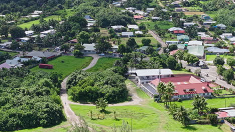 fare, huahine island, french polynesia. aerial view of village, buildings and streets