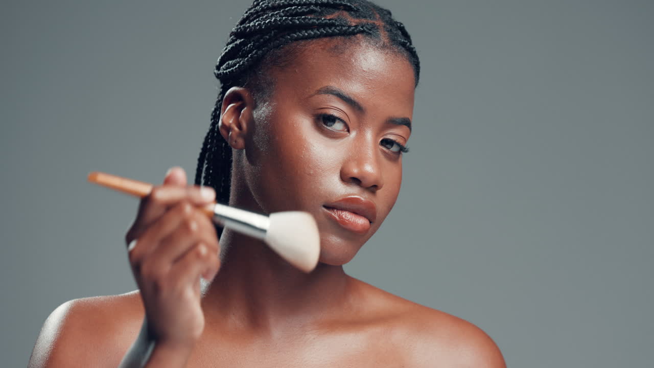 Beautiful Woman Applying Makeup