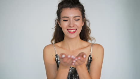 young pretty woman wearing evening dress dancing at a new year's eve party enjoying a glamorous celebration 1