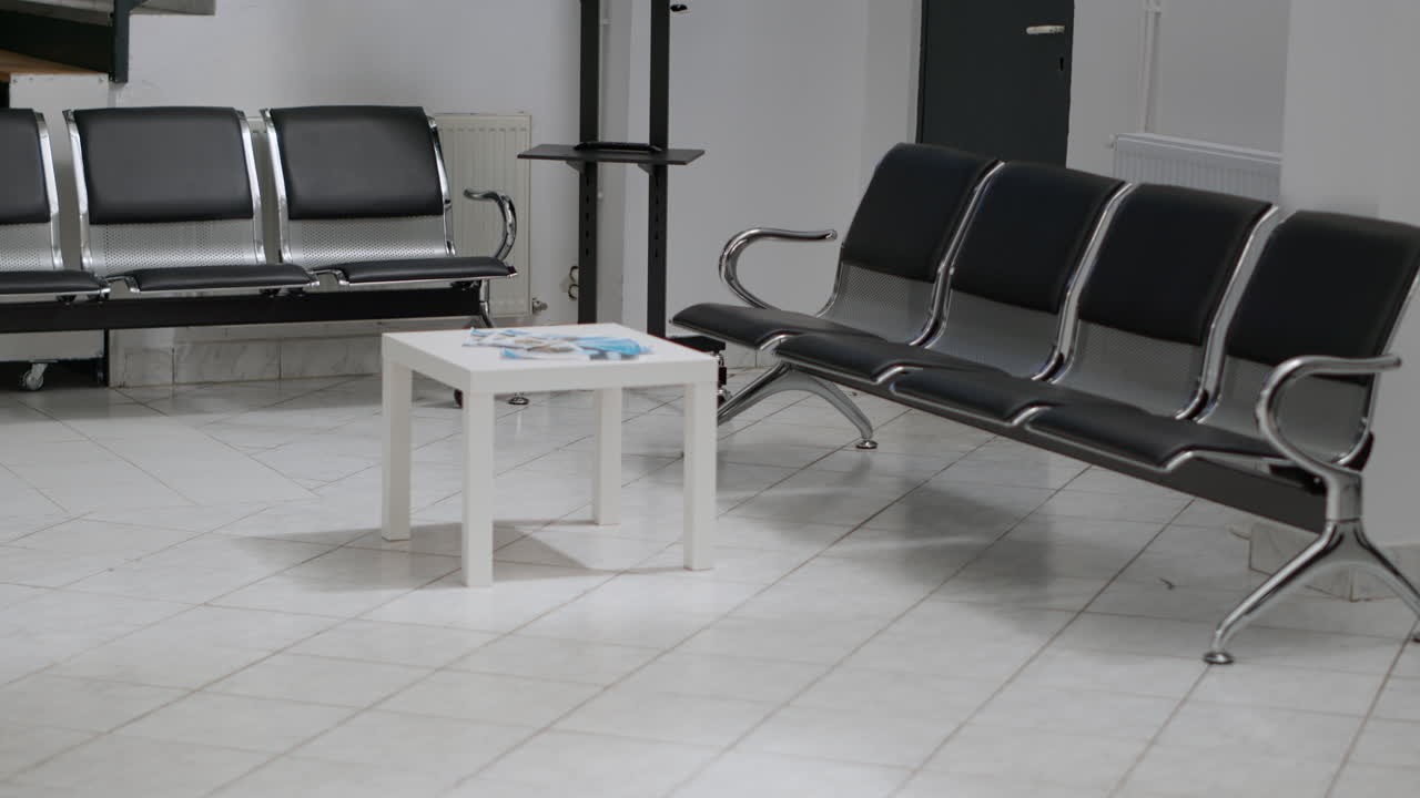 Waiting area with chairs and a television