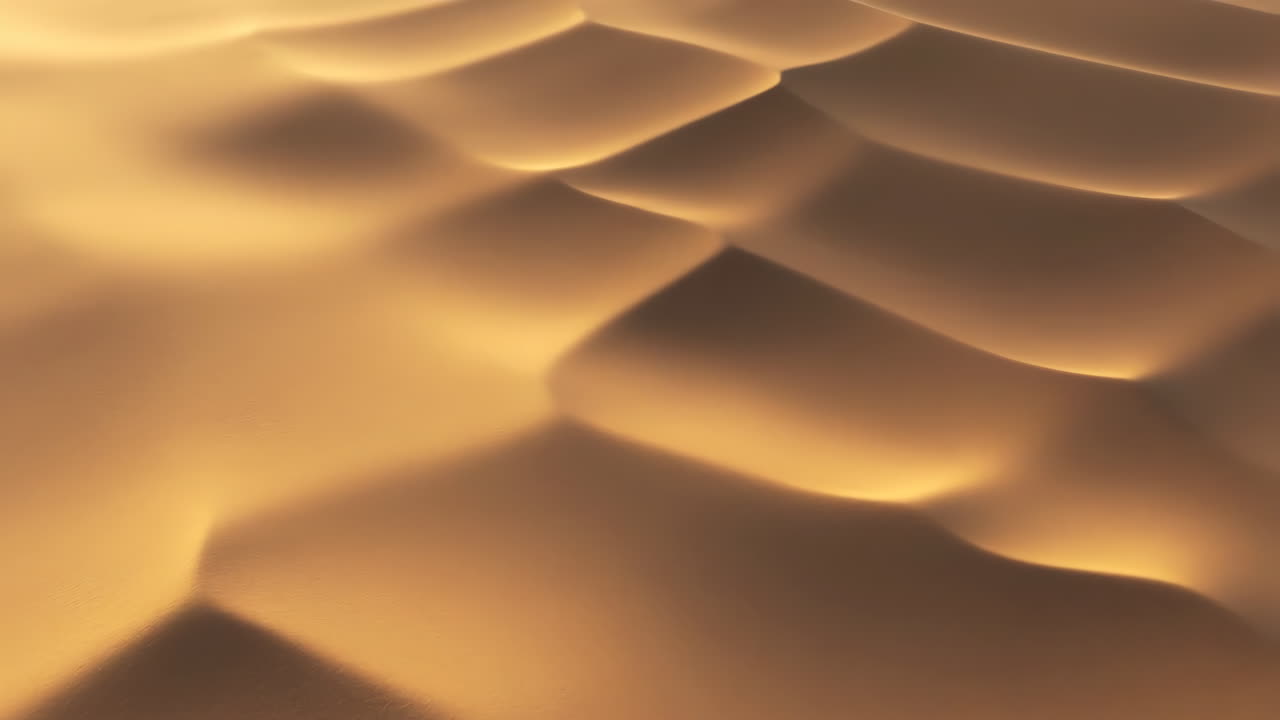 Abstract Golden Sand Dunes with Rippling Shadows