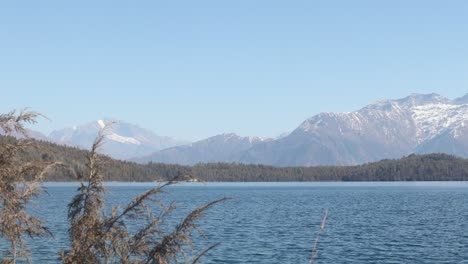 Timelapse-of-Rara-lake,-Mugu,-Nepal-with-snow-clad-mountains-in-the-background-1