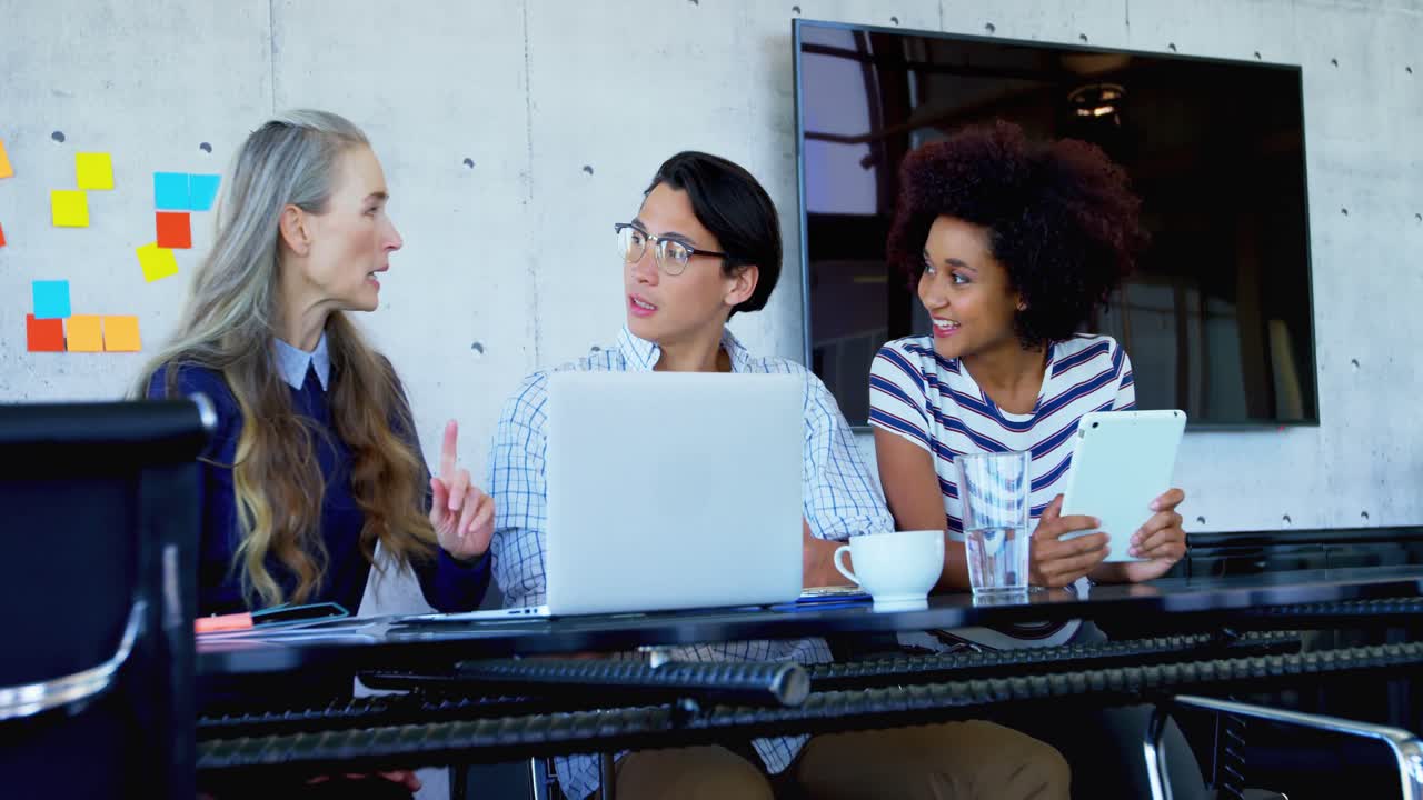 Colleagues interacting with each other 4k