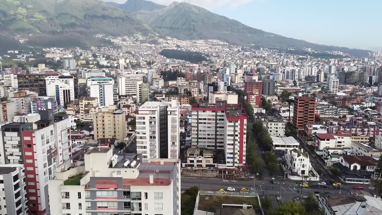 Aerial View of a City Nestled in the Mountains