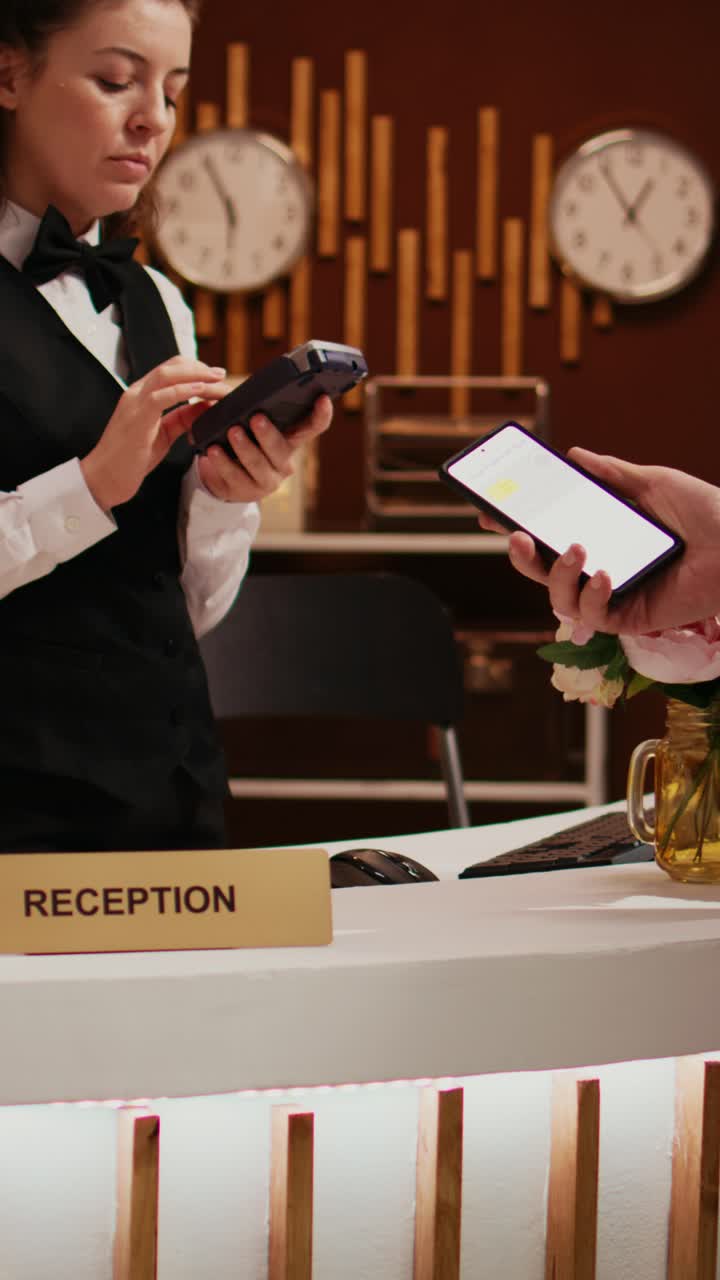 Vertical Video Elderly man makes nfc transaction