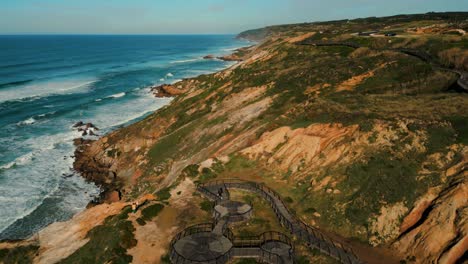 aerial shot over passadicos de foz do arelho on the atlantic coastline of the oeste region in portugal on a sunny day