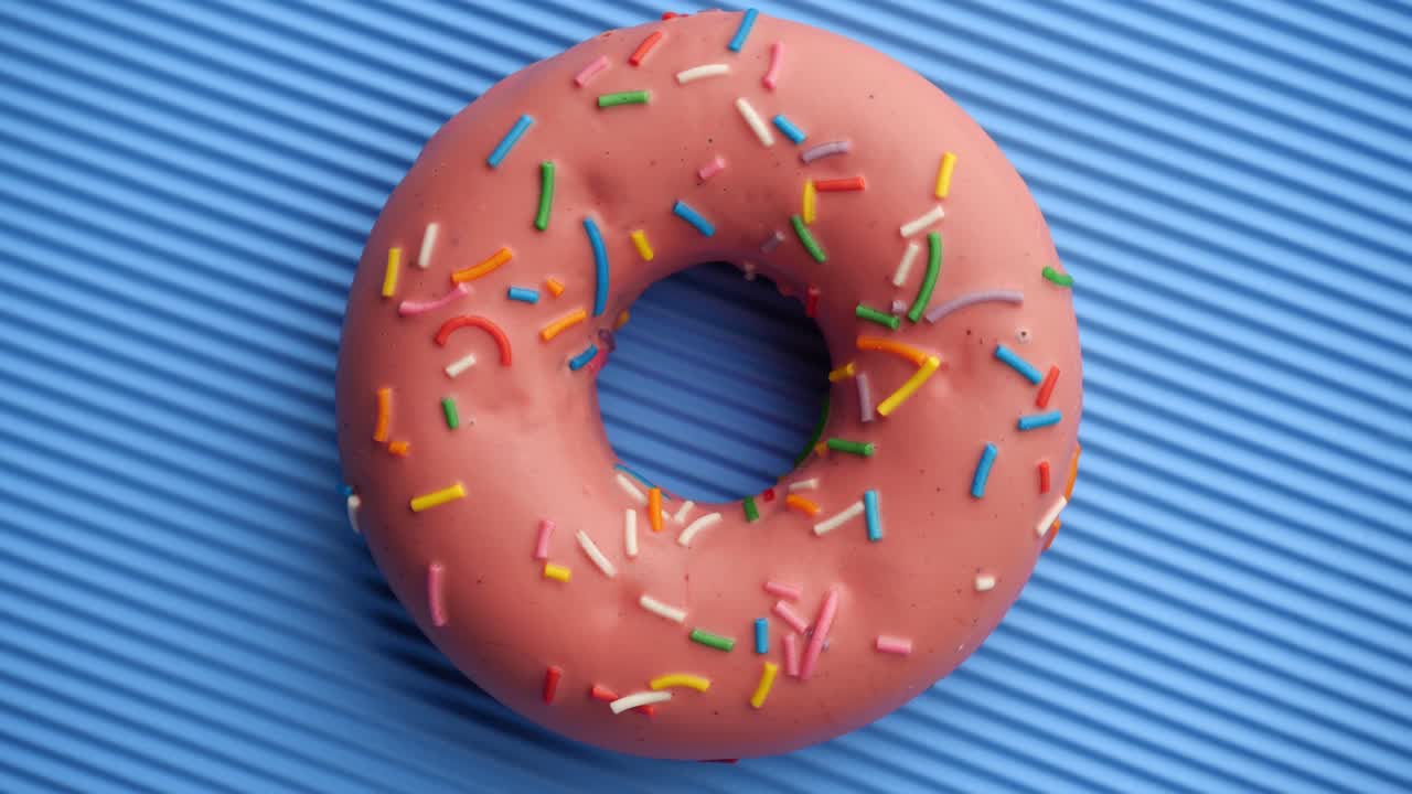 el donut está vidriado de cerca, con un bucle sin costuras.