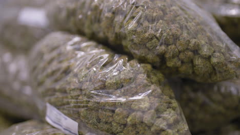 Close-up-shot-of-Marijuana-Bags-ready-to-distribution,-tracking-in-motion,-California