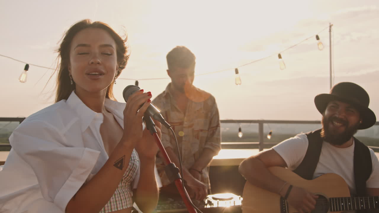 Musicians Playing at Party on Rooftop Terrace