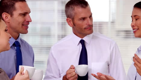 business people having a coffee together