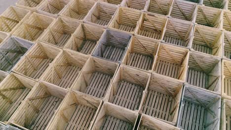 folded empty wooden boxes in warehouses, boxes are designed for harvesting fruits and vegetables