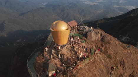 Fly-over-the-top-of-the-mountain-with-tourists-walking-on-glass-bridge