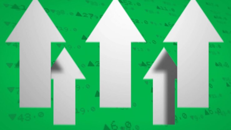 Datos del mercado de valores moviéndose sobre pantalla verde