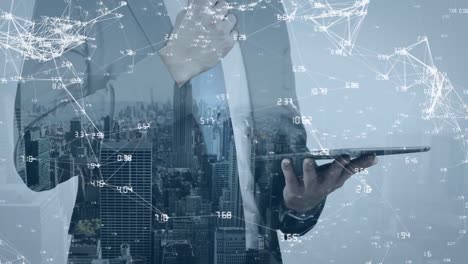 animation of network of connections over caucasian businessman using tablet