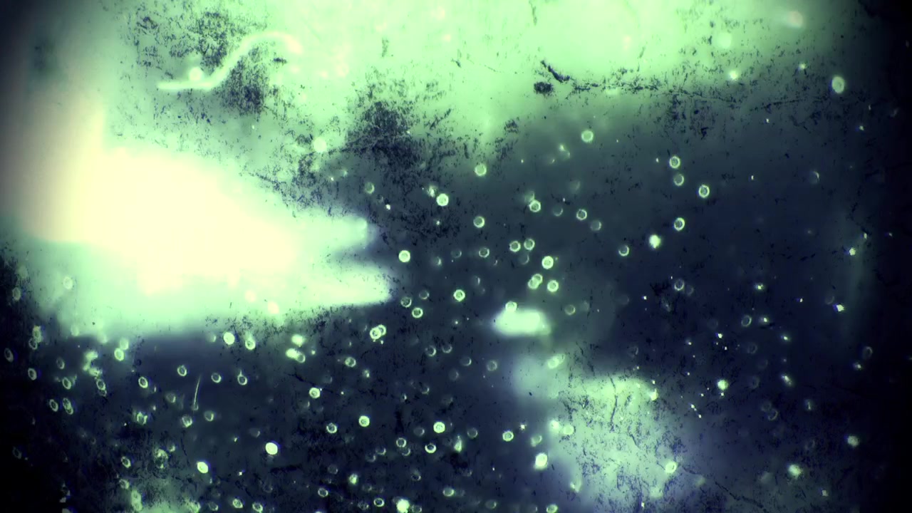 Perdita di luce verde astratta con grana di pellicola vintage e bokeh