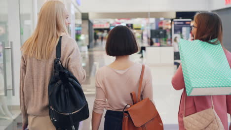 friends shopping in a mall