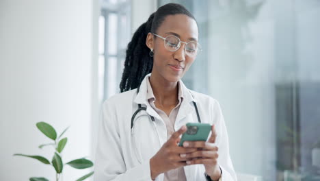 happy woman, phone and doctor typing in hospital