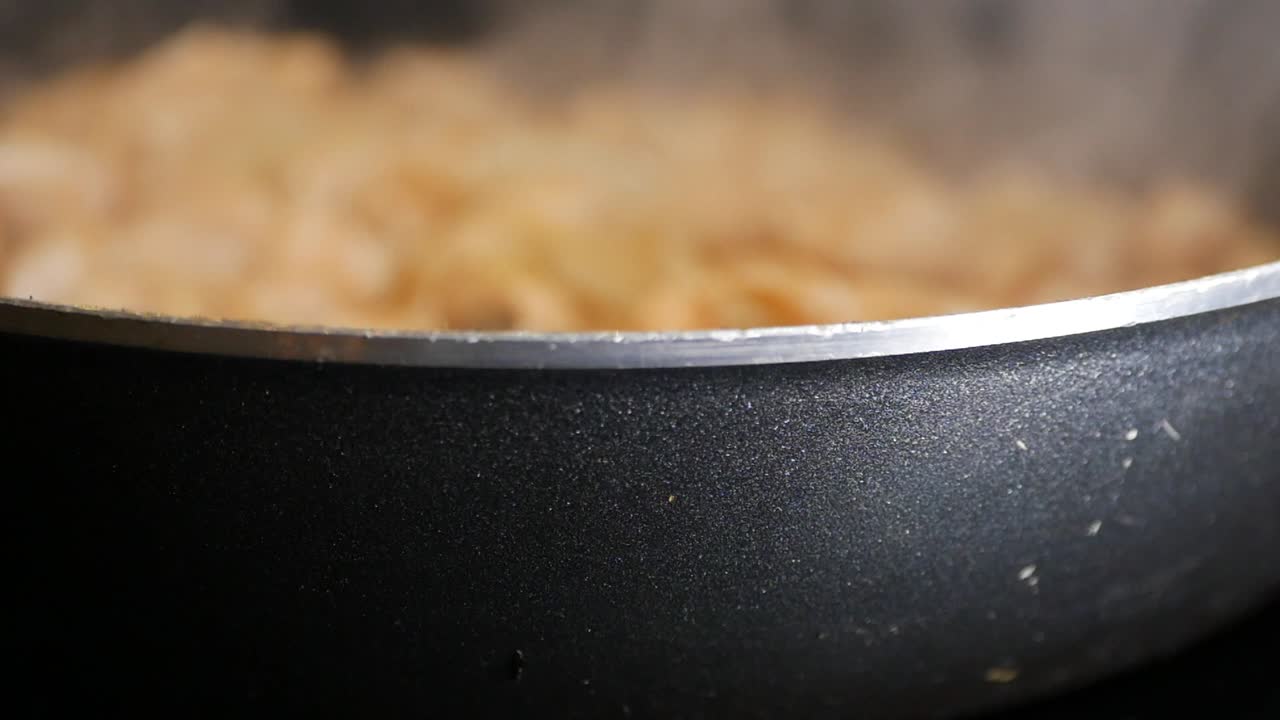 cocción de alimentos en una sartén