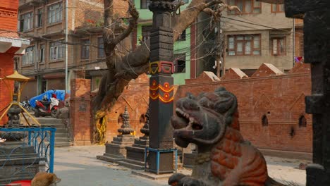 Establishing-clip-of-ornate-religious-carvings-outside-temple-in-centre-of-Kathmandu-City