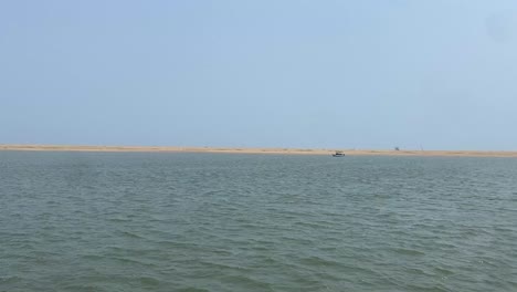 A-tourist-boat-sailing-in-the-river-near-Chilka-lake-in-Orissa