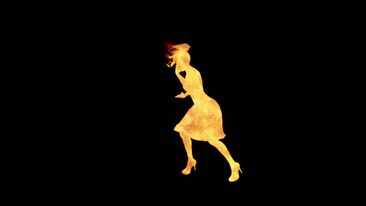 A modern youth dance performed by a graceful and sexy female silhouette, in the backdrop of fire