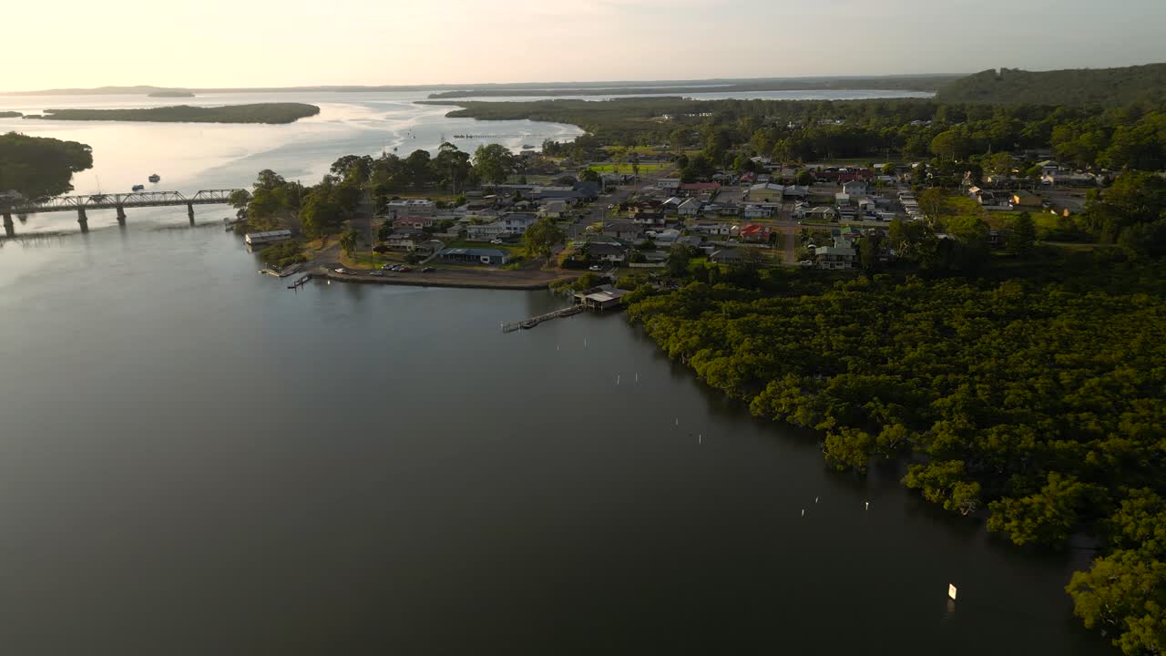 Left to right sunrise aerial view of the regional town of Karuah, New South Wales, Australia..