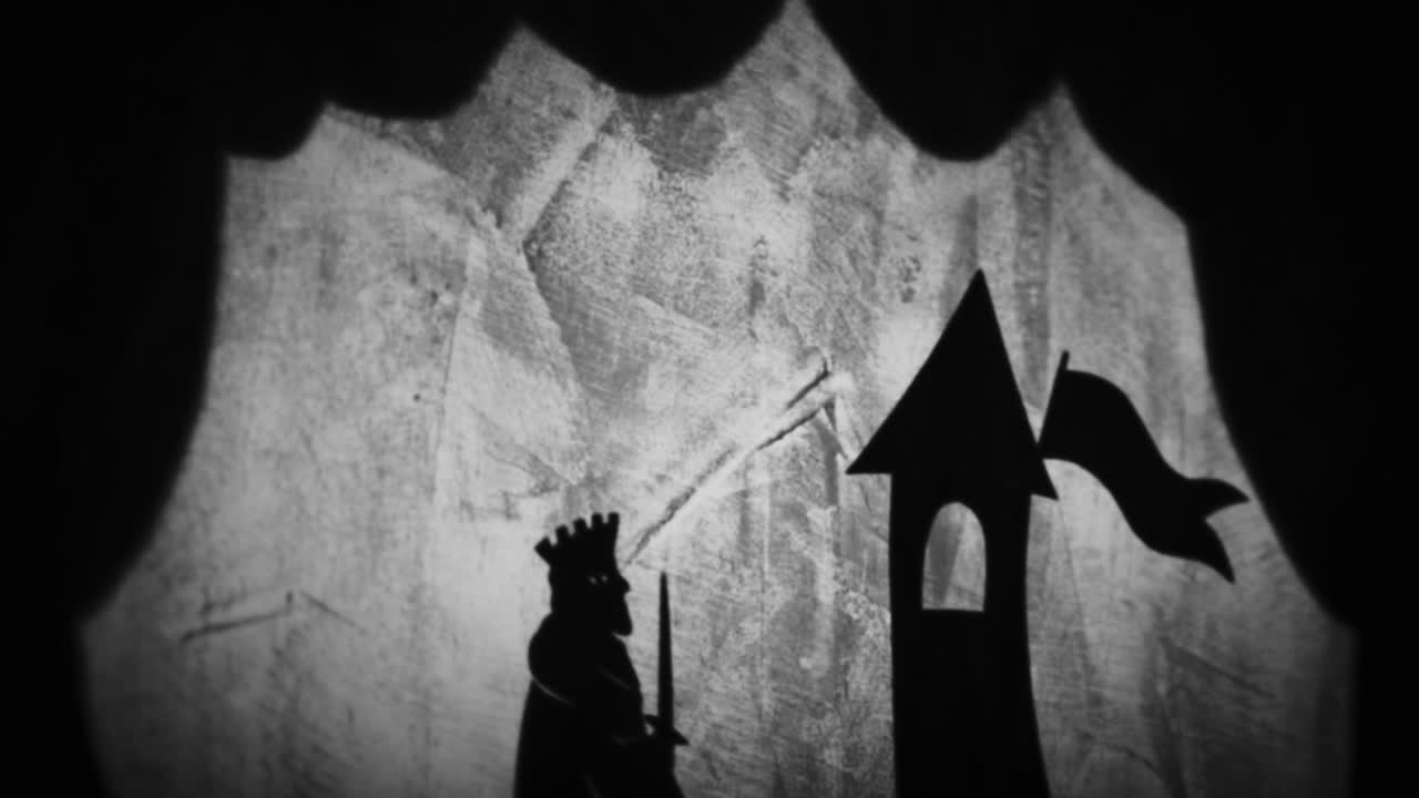 Spettacolo di ombre cinesi di un re e un castello