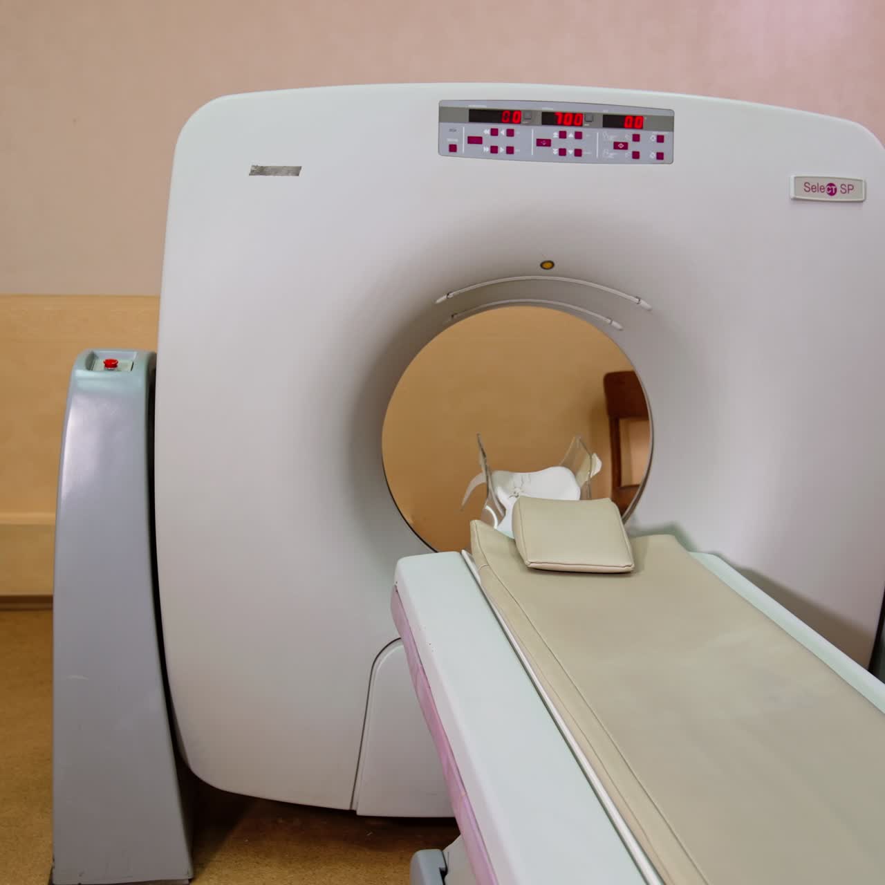 CT scanner with numbers on the display on. Hospital room for magnetic resonance diagnostics
