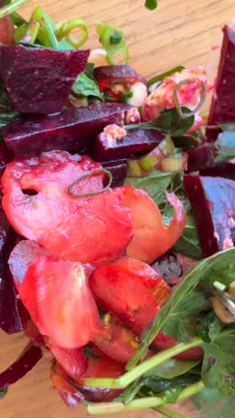 close-up of a fresh beet and spinach salad